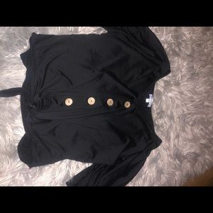 Women’s large black top with buttons.